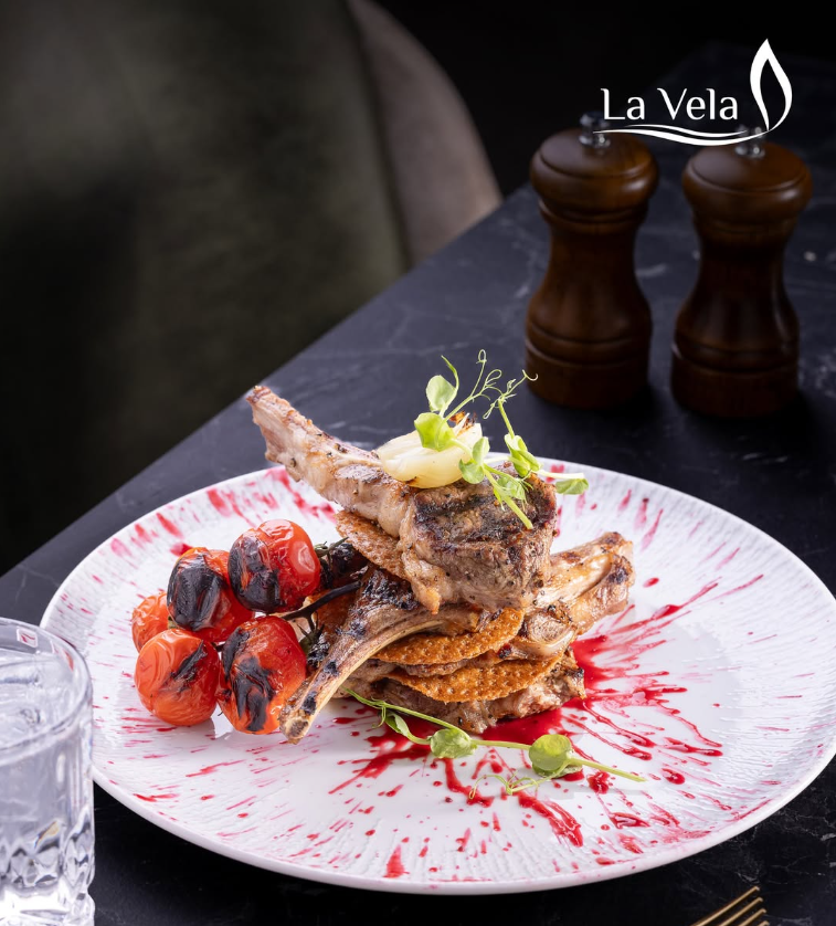 A plated dish at La Vela by candlelight